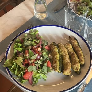 Zucchine ripiene alla ligure con insalata di portulaca
