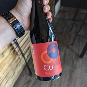 Cu