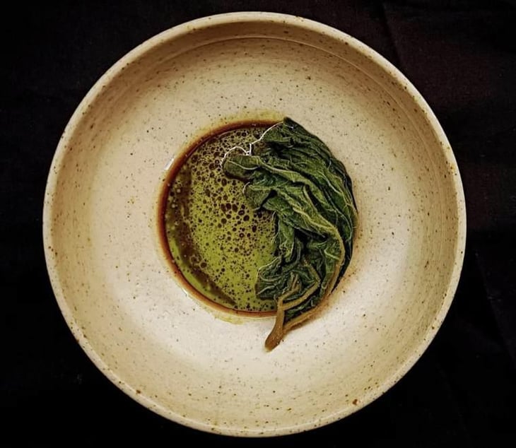 Pumpkin Leaf. Pickled 2 Months And Preserved In A 5% Brine. Now Stuffed With Hokkaido And Szechuan. Served With Tarragon And Freshly Pressed Pumpkin Seed Oil. - Bistro Flores - 532093